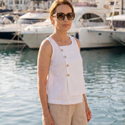 Blouse asymétrique sans manches en lin et coton blanc